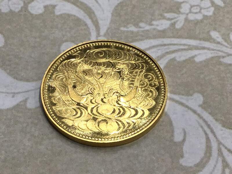 K 24金天皇在位記念10万円コイン　をお買取りしました。