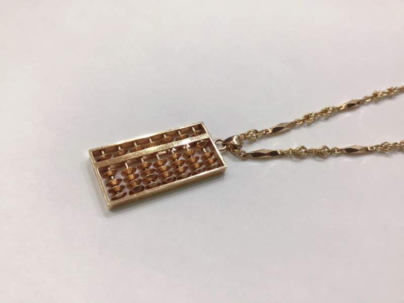 18金 そろばん ネックレス をお買い取り致しました。